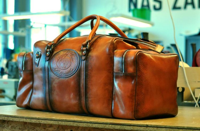 Cestovní kožené tašky patří mezi naši hlavní výstavní skříň Brašnářství Tlustý